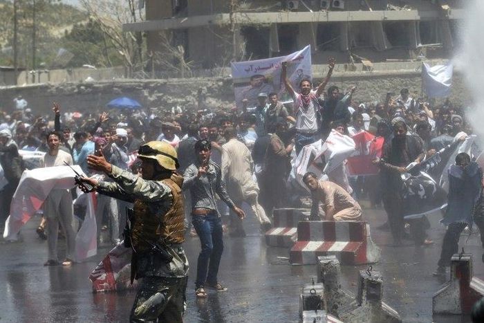Afghan security forces use water canons to disperse protesters at an anti-government demonstration following a deadly truck bomb attack in Kabul on June 2, 2017