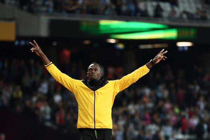 Jamaica's Usain Bolt takes part in a lap of honour on the final day of the 2017 IAAF World Championships at the London Stadium in London on August 13, 2017