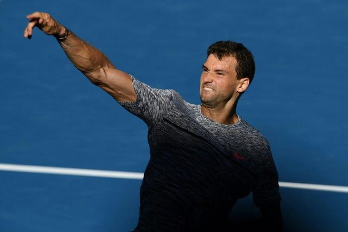 Bulgaria's Grigor Dimitrov celebrates his victory against Belgium's David Goffin during their men's singles quarter-final at the Australian Open in Melbourne on January 25, 2017