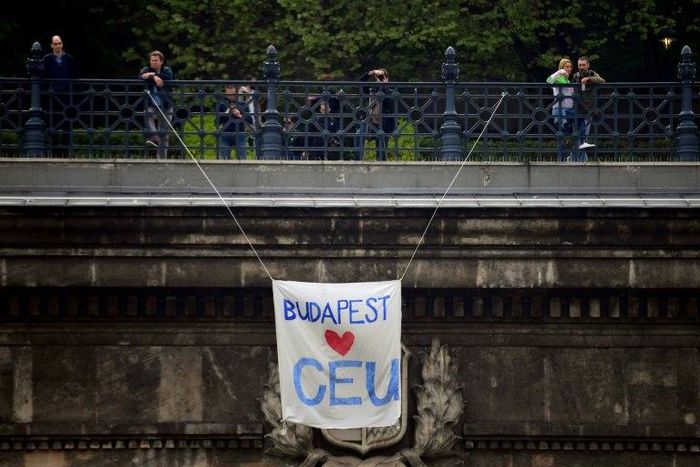 A banner hangs over the Budapest tunnel, as Students and teachers of the Central European University protest in Budapest in April 2017