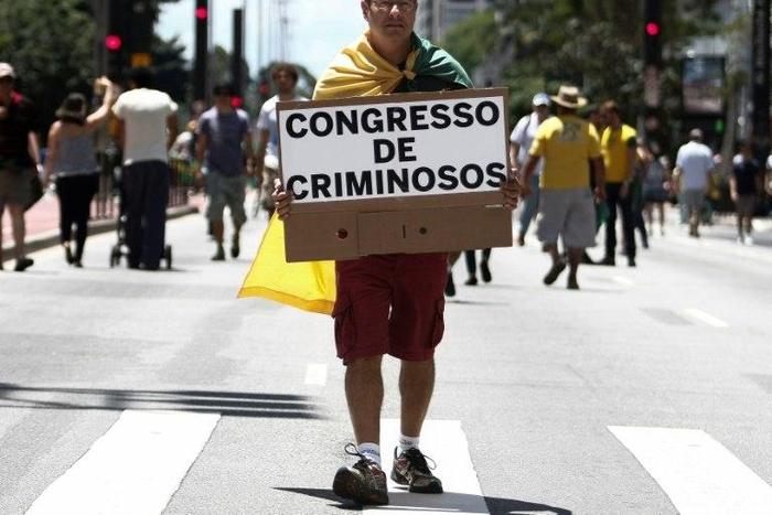 Demonstrators in Sao Paulo, Brazil march in support of investigations into a sprawling corruption scheme centered on state oil company Petrobras
