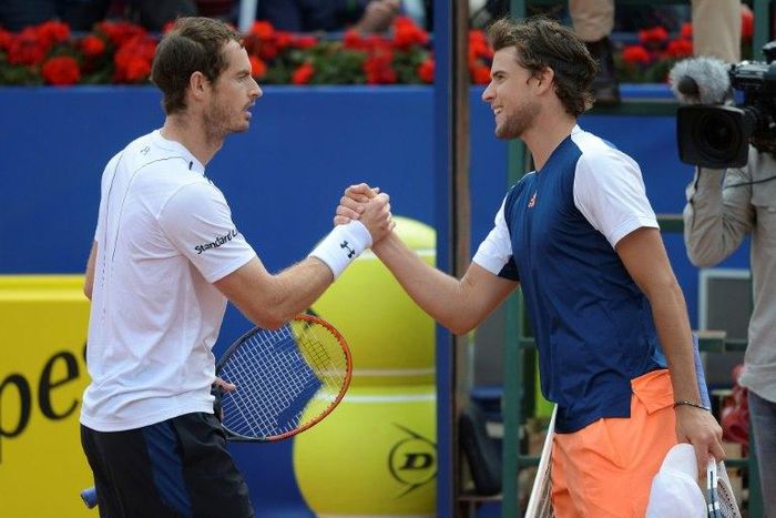 Andy Murray (L) lost his semi-final clash at the Barcelona Open to Dominic Thiem in three sets on April 29, 2017