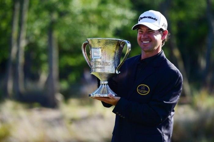 Brian Harman poses with the trophy after winning the Wells Fargo Championship at Eagle Point Golf Club on May 7, 2017 in Wilmington, North Carolina