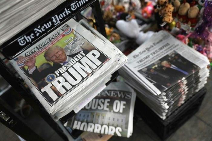 Front pages from New York City newspapers feature President-elect Donald Trump, on November 9, 2016