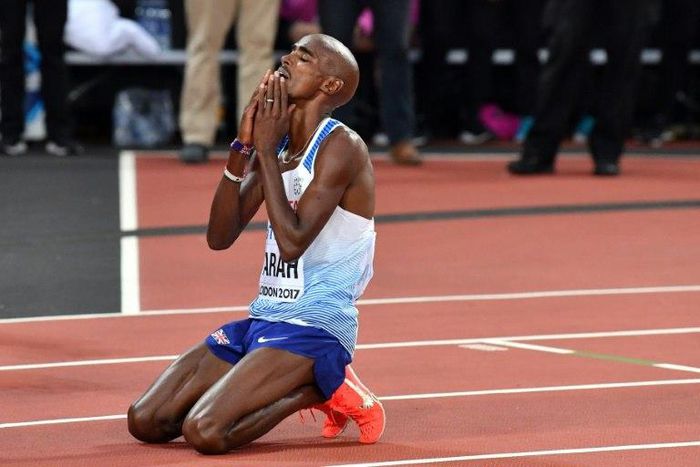 Britain's Mo Farah reacts after finishing second in the final of the men's 5000m at the IAAF World Championships in London on August 12, 2017
