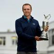 US golfer Jordan Spieth poses for pictures with the Claret Jug