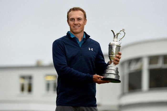 US golfer Jordan Spieth poses for pictures with the Claret Jug