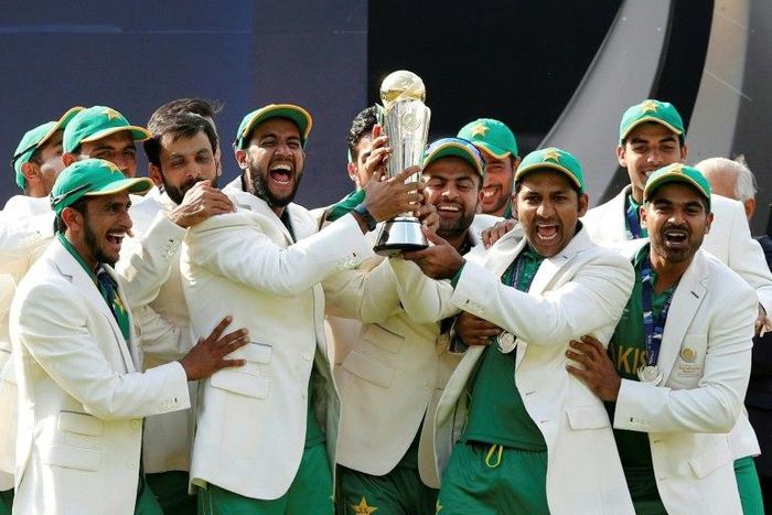 The last champions? Pakistan's Sarfraz Ahmed lifts the Champions Trophy in London on Sunday as his team celebrates but the ICC is considering scrapping the tournament in favour of a biennial Twenty20 World Cup