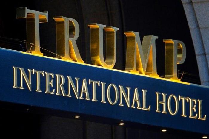 A man armed with a semi-automatic rifle is arrested at the Trump International Hotel