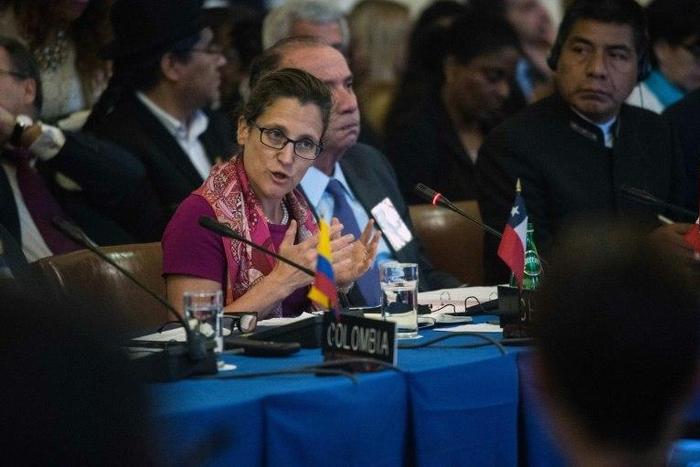 Foreign Minister Chrystia Freeland says Canada will increase defense spending and rely less on the United States, a major foreign policy shift