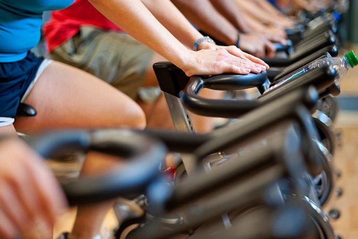 Are you seriously going to make yourself sprint on a bike with the resistance cranked up as high as you can stand it by yourself? Odds are no. Group exercise makes you work harder than you would alone, partially because the instructor won't let you sla...