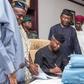 Acting President, Prof. Osinbajo signing the budget with other officials of government .