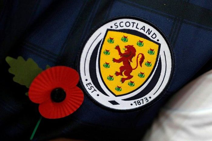 A Scottish supporter pay respect to the country's war dead before a World Cup 2018 qualification match against England at Wembley Stadium in November 2016