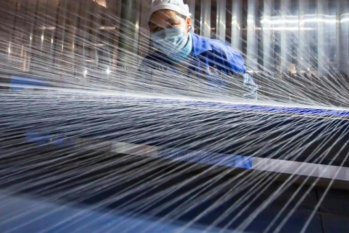 Output by Chinese factories and workshops slowed sharply in July, growing by a lower-than-expected 6.4 percent compared to the same month last year, official figures showed on Monday