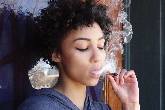 An American woman smoking weed
