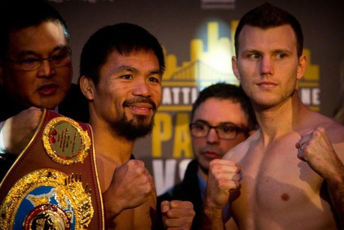 Philippine World Boxing Organization champion Manny Pacquiao (L) poses for photos with Australian contender Jeff Horn during their pre-fight weigh-in at Suncorp Stadium in Brisbane, on July 1, 2017