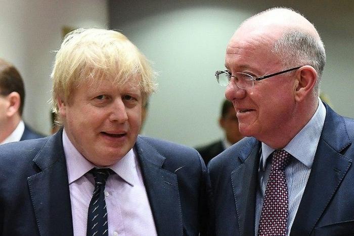 UK Foreign Secretary Boris Johnson (L) and Ireland's Foreign Minister Charlie Flanagan arrive to attend a foreign affair council at the European Council in Brussels, on March 6, 2017