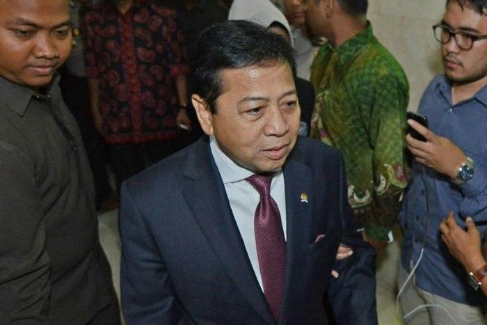 Investigators allege that Novanto (C) was among many politicians who received kickbacks from funds earmarked for a government project to issue new ID cards to the country's 255 million inhabitants