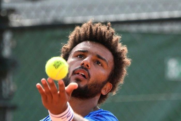France's Maxime Hamou wass banished from the Roland Garros tournament after kissing a television reporter against her will during an interview