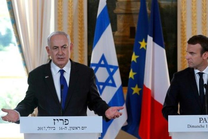 French President Emmanuel Macron called for a resumption of Middle East peace talks when he met Israeli Prime Minister Benjamin Netanyahu in Paris