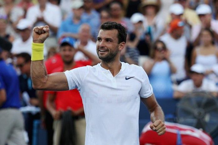 Grigor Dimitrov of Bulgaria celebrates after defeating Nick Kyrgios of Australia to win the Cincinnati Masters