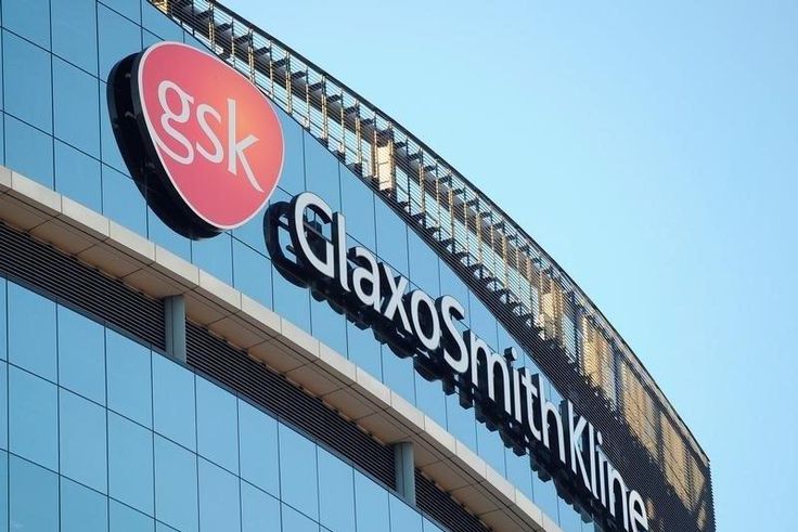 A GlaxoSmithKline logo is seen outside one of its buildings in west London, February 6, 2008. REUTERS/Toby Melville/File Photo