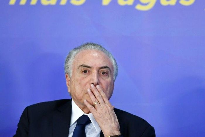 Brazilian President Michel Temer looks on during a public event as his fate is weighed by Brazil's Congress