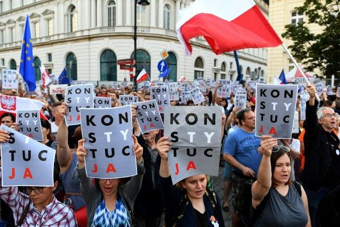 Protesters have taken to the streets across Poland after lawmakers adopted a controversial reform of the Supreme Court despite the threat of unprecedented EU sanctions