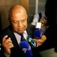South African finance minister Pravin Gordhan speaks with journalists outside of the High Court on March 28, 2017 in Pretoria