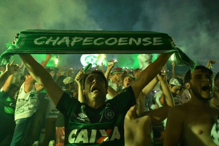 Fans of Brazilian club side Chapecoense pay tribute to players killed in a plane crash in November 2016