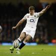 England's centre Owen Farrell kicks a penalty during the Six Nations international rugby union match against Wales February 11, 2017