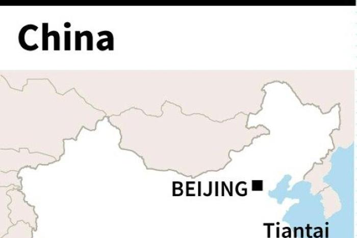 The area where a fire at a massage parlour killed at least 18 people on Sunday