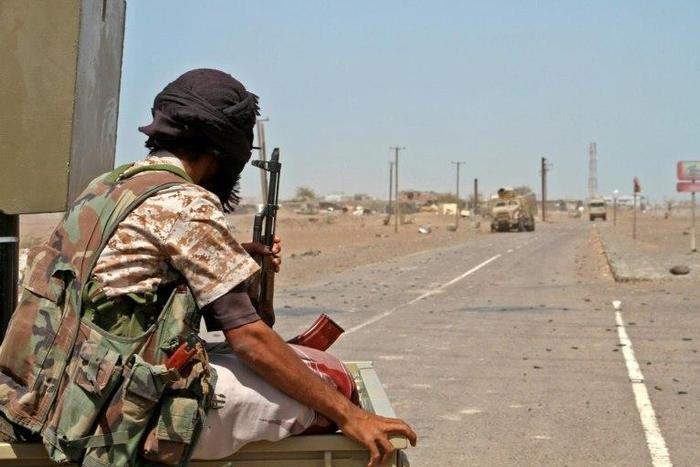 Pro-government forces advance in Mokha last month as they try to drive Shiite Huthi rebels away from the Red Sea coast