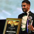 Algerian and Leicester forward Riyad Mahrez poses for a photo after being crowned African Footballer of the Year in Abuja, on January 5, 2017