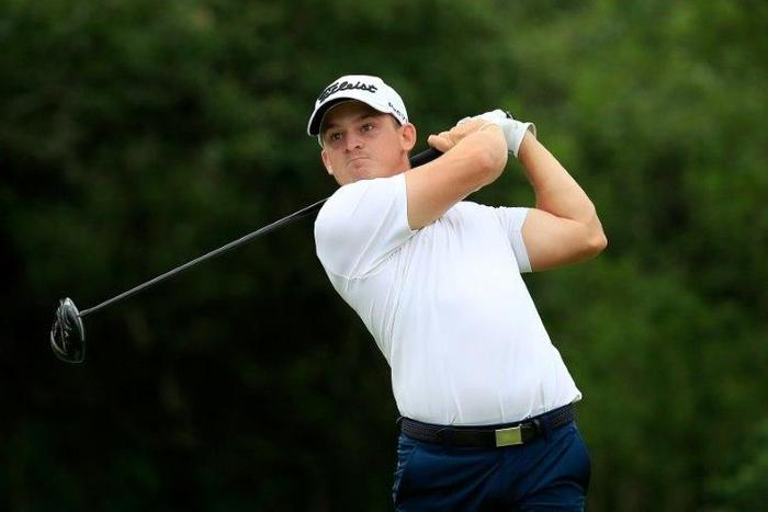 Bud Cauley plays his shot from the ninth tee during the second round of the Texas Open in San Antonio, Texas