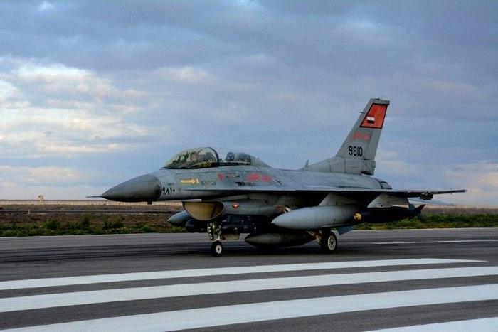 A handout picture released by the Egyptian defence ministry on February 16, 2015 shows a fighter jet landing at an undisclosed location in Egypt following air strikes in Libya