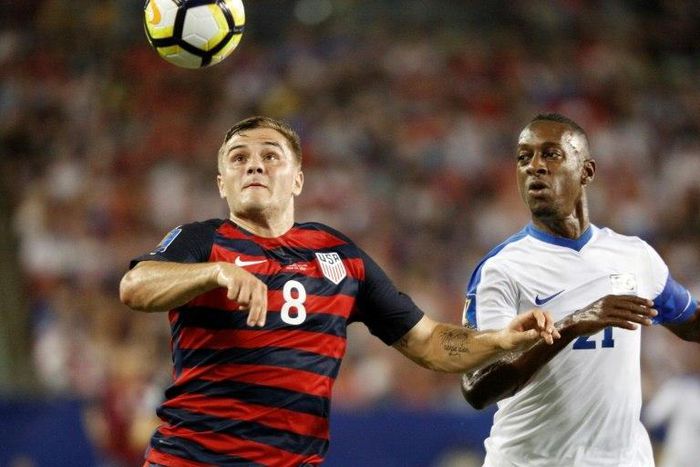 Jordan Morris (L) scores twice to give the united States a 3-2 win over Martinique in the CONCACAF Gold Cup in Tampa, Florida