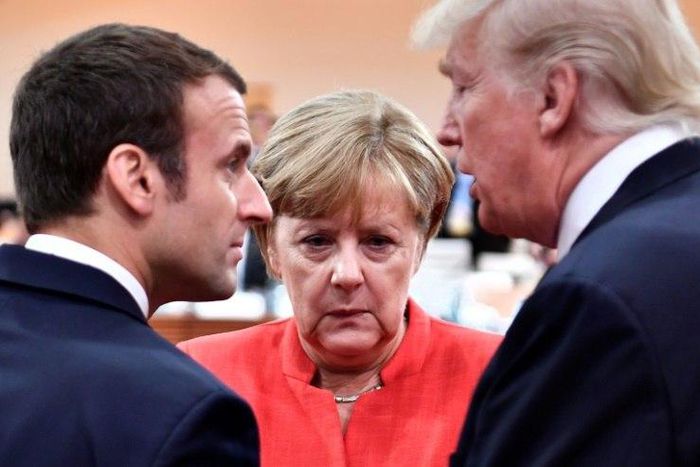 Three's a crowd? Macron, Merkel and Trump share a moment at the G20 summit in Hamburg