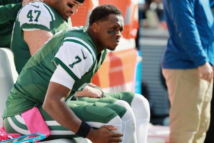 New York Jets quarterback Geno Smith sits on the sidelines after being taken out of the game due to a knee injury against the Baltimore Ravens on October 23, 2016