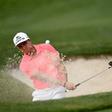Rickie Fowler of the US hits his third shot from a greenside bunker on the 15th hole during the first round of the Shell Houston Open, in Humble, Texas, on March 30, 2017