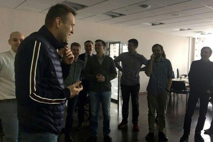 This handout picture obtained on April 10, from Leonid Volkov's Twitter account shows Alexei Navalny speaking with employees at the offices of his anti-corruption foundation in Moscow