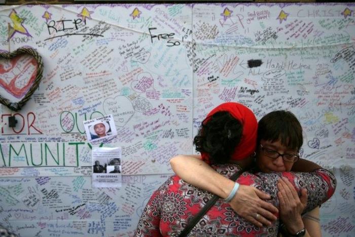 "Pray For Our Community", reads one message on the wall of remembrance for victims of this week's London high-rise fire