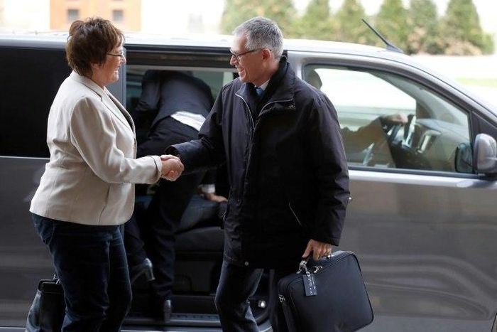 German Economy and Energy Minister Brigitte Zypries welcomes Peugeot chief executive Carlos Tavares for talks on the planned takeover of General Motors' European subsidiary Opel by the French carmaker