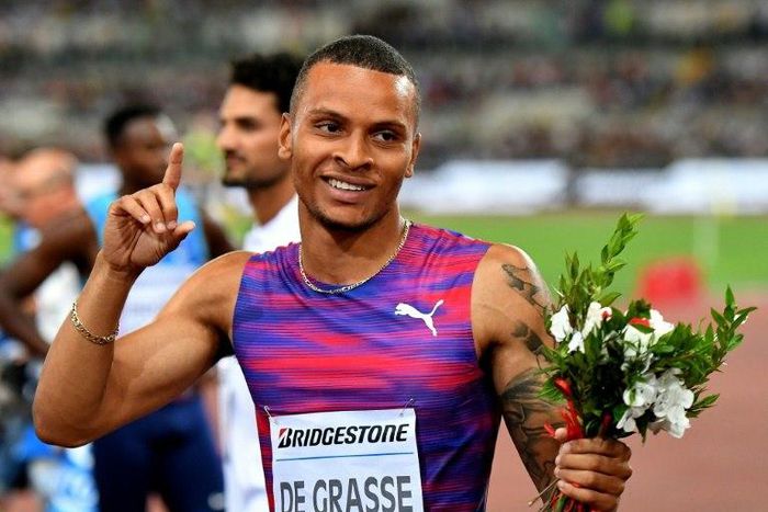 Canada's Andre de Grasse celebrates after winning the men's 200m event at the Rome meeting of the IAAF Diamond League athletics competition at the Olympic Stadium in Rome on June 8, 2017