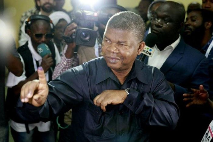 Joao Lourenco, the expected successor to Angola's longtime President Jose Eduardo dos Santos, shows his inked finger after voting in Luanda
