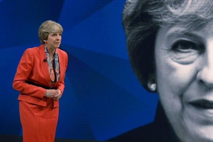British Prime Minister Theresa May answers questions from the studio audience as she takes part in the "May v Corbyn Live: The Battle for Number 10", Sky News and Channel 4 event in at Sky Studios in London, on May 29, 2017