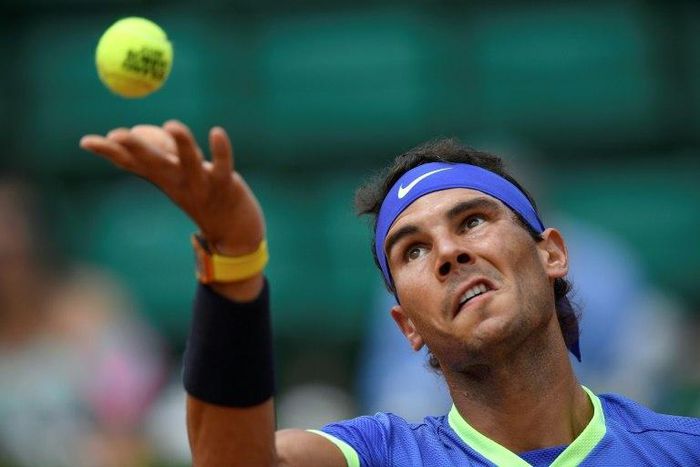 Spain's Rafael Nadal serves to France's Benoit Paire during their first round match at the French Open on May 29, 2017