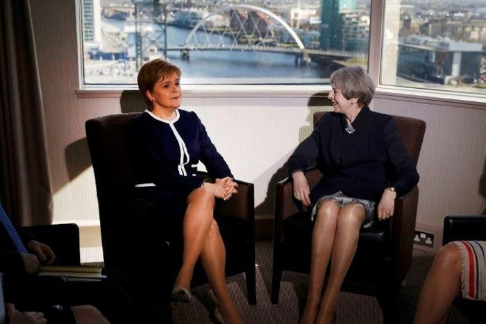 Britain's Prime Minister Theresa May (R) and Scotland's First Minister Nicola Sturgeon pose ahead of their meeting in a Glasgow hotel on Monday, but their talks failed to bridge the divide over Scottish independence