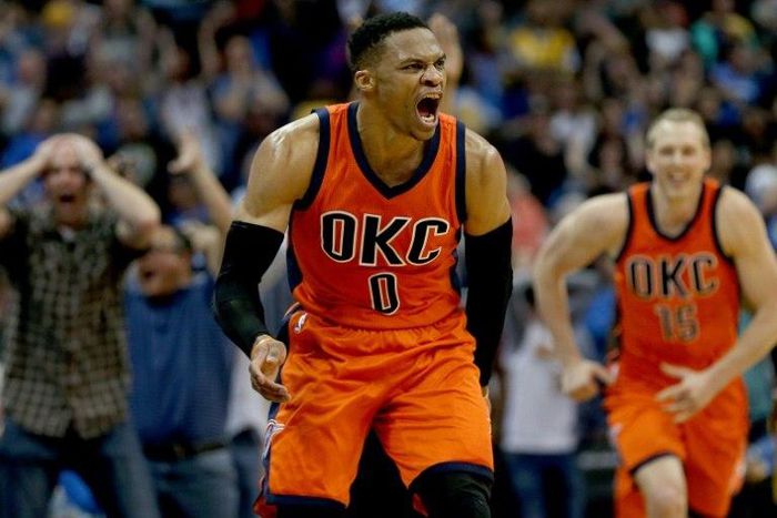 Russell Westbrook of the Oklahoma City Thunder celebrates after scoring a game-winning three-pointer at the buzzer against the Denver Nuggets, at Pepsi Center in Denver, Colorado, on April 9, 2017