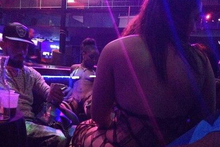 Nigerian rap star Phyno in a strip club